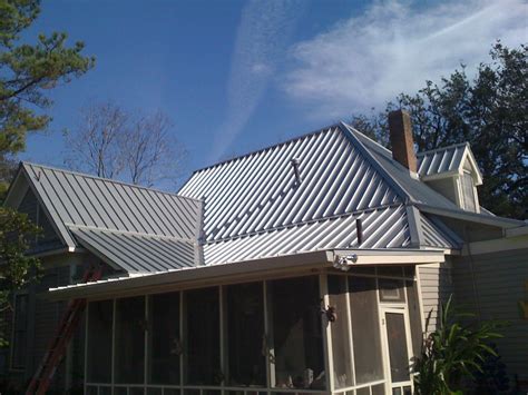 pictures of carriage houses with silver metal roofs|pictures of metal roofing.